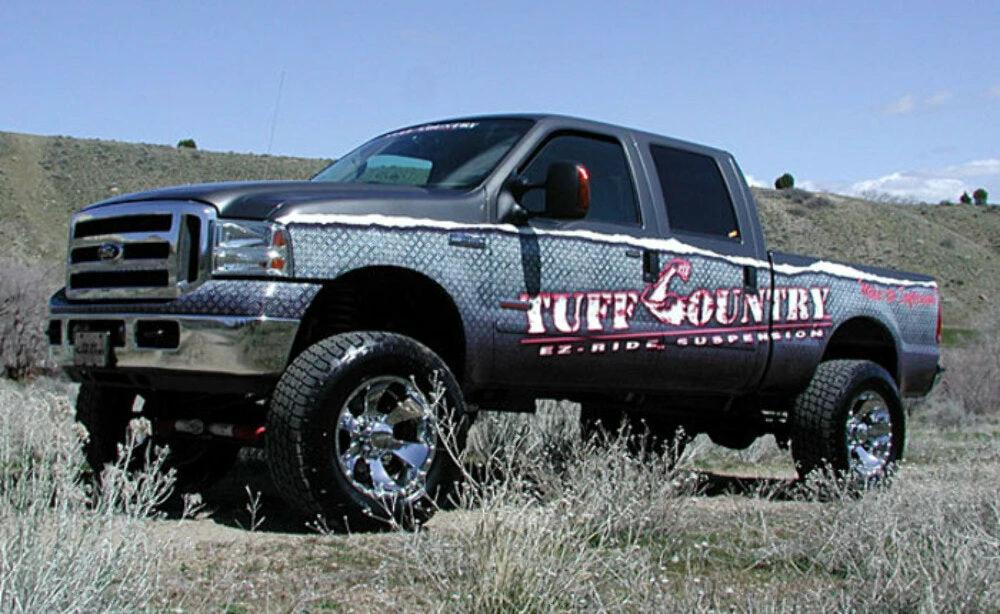 Tuff Country Tuff Country 26974KN 6" Lift Kit with Coil Springs Replacement Radius Arm Drop Brackets Rear Blocks and U-Bolts with SX8000 Shocks - Vehicle Parts & Accessories Lift Kits